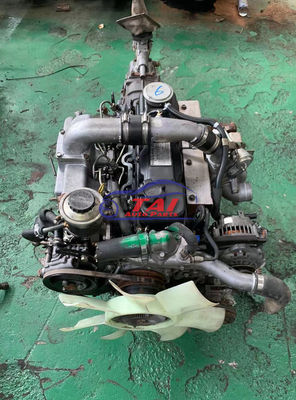 Buen precio Japón QD32 Turbo Nissan Motor Parts Motor diesel con caja de cambios para Nissan Cabstar en línea