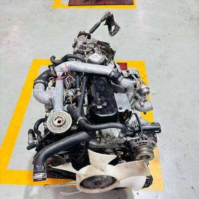 Buen precio Ensamblaje de motor diésel QD80 con turbocompresor e intercooler de 3.15L de cilindrada para emisiones Euro3 y Euro4 y bloque de cilindros de hierro fundido reforzado en línea